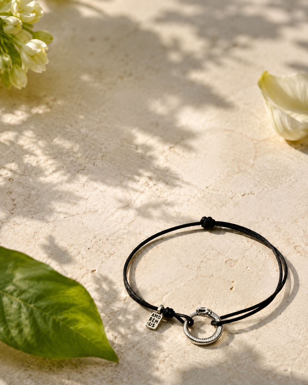 Ouroboros Bracelet on a black cord, sterling silver 925