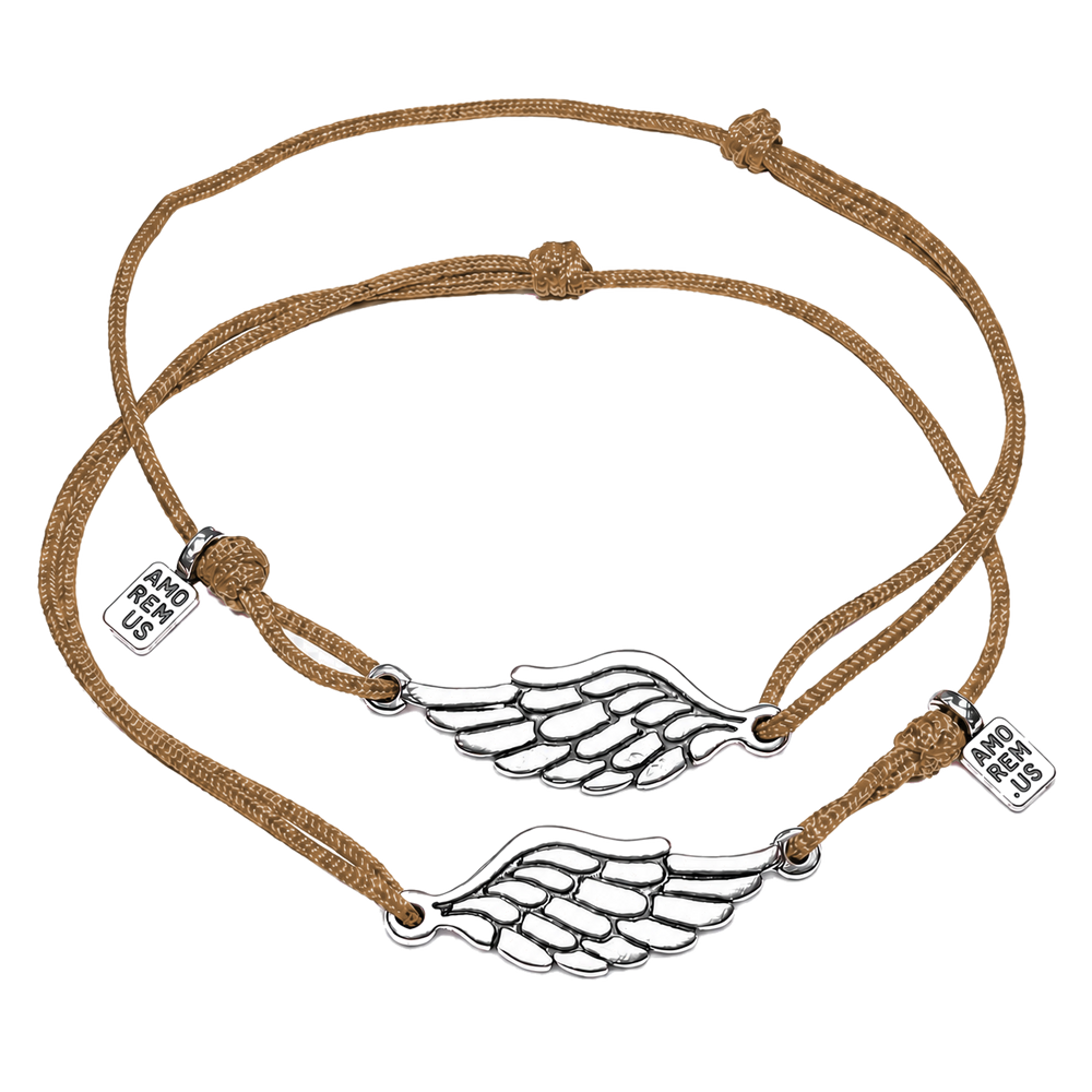 Matching couple bracelets — two sterling silver wing charms on brown cords, Second Wing set