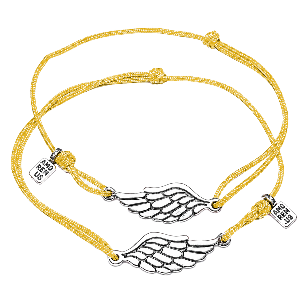 Matching couple bracelets — two sterling silver wing charms on yellow cords, Second Wing set